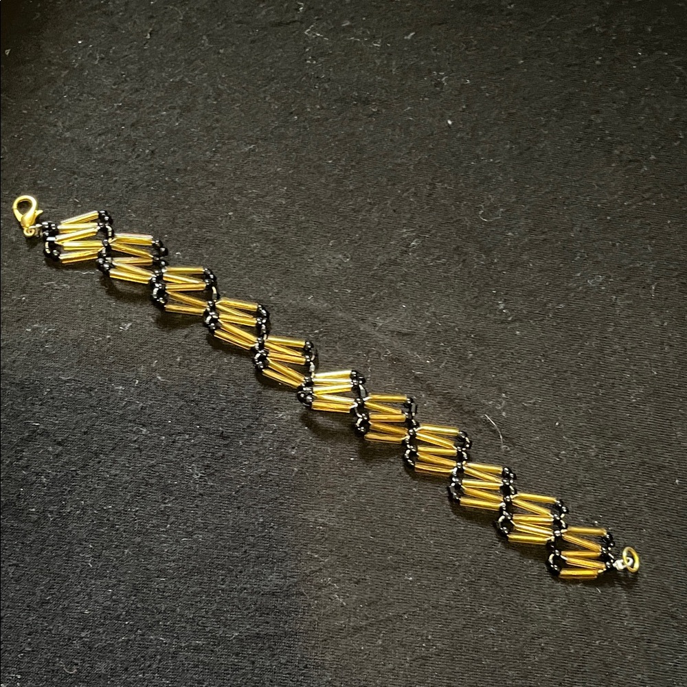 Elegant Gold and Black Bracelet
